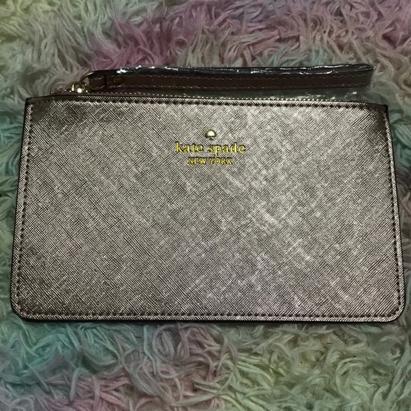 kate spade Handbags - NWT KATE SPADE WRISTLET! Color: Pink